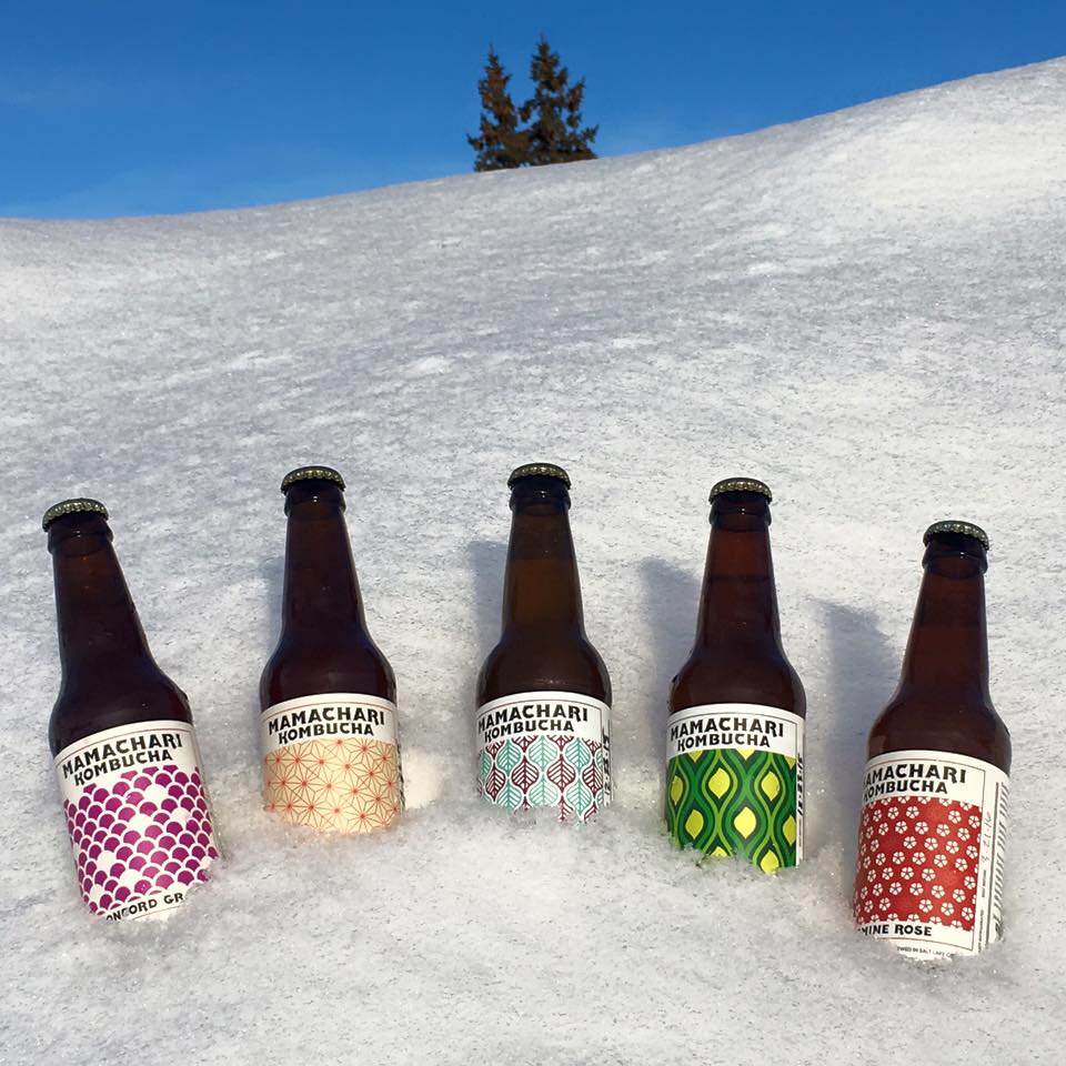 Mamachari Kombucha various flavors in bottles in the snow