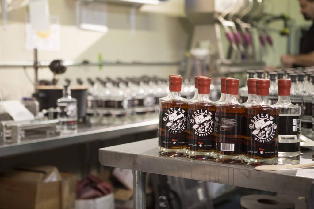Outlaw Distillery rum in a production area