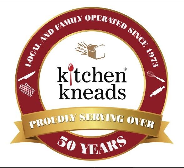 Kitchen Kneads logo showing a red circle with text stating: local and family operated since 1973, Proudly serving over 50 years