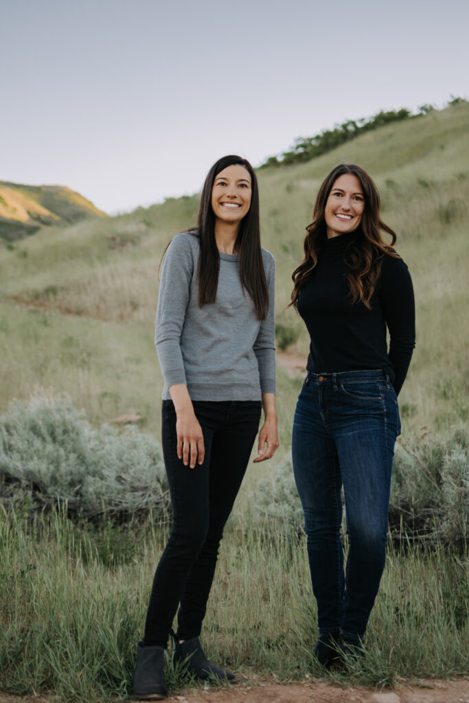 Two friends posing together for a photo