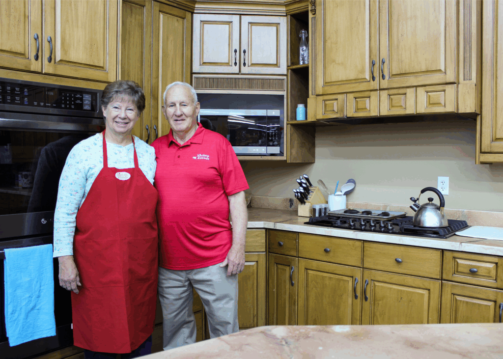 Bruce and Carla standing in a kitchen