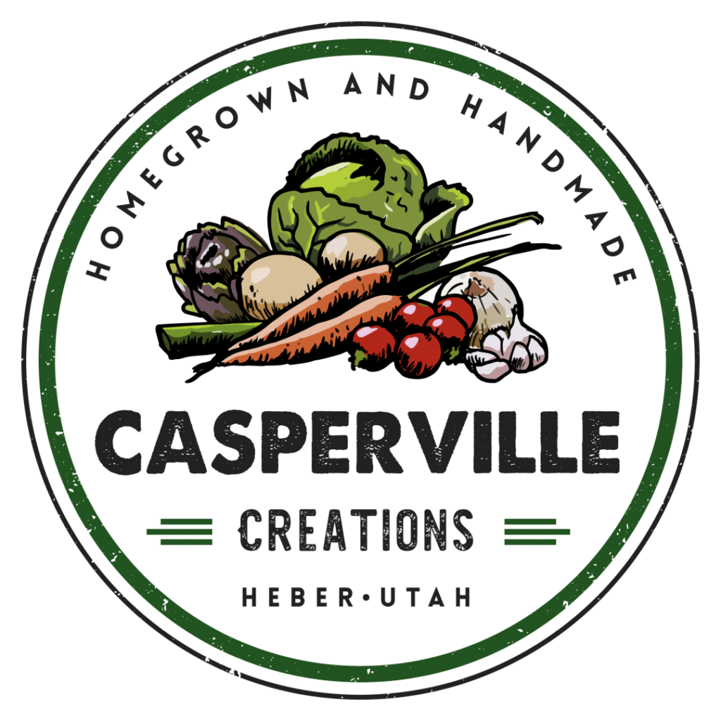 A logo featuring a variety of fresh vegetables in black and green colors