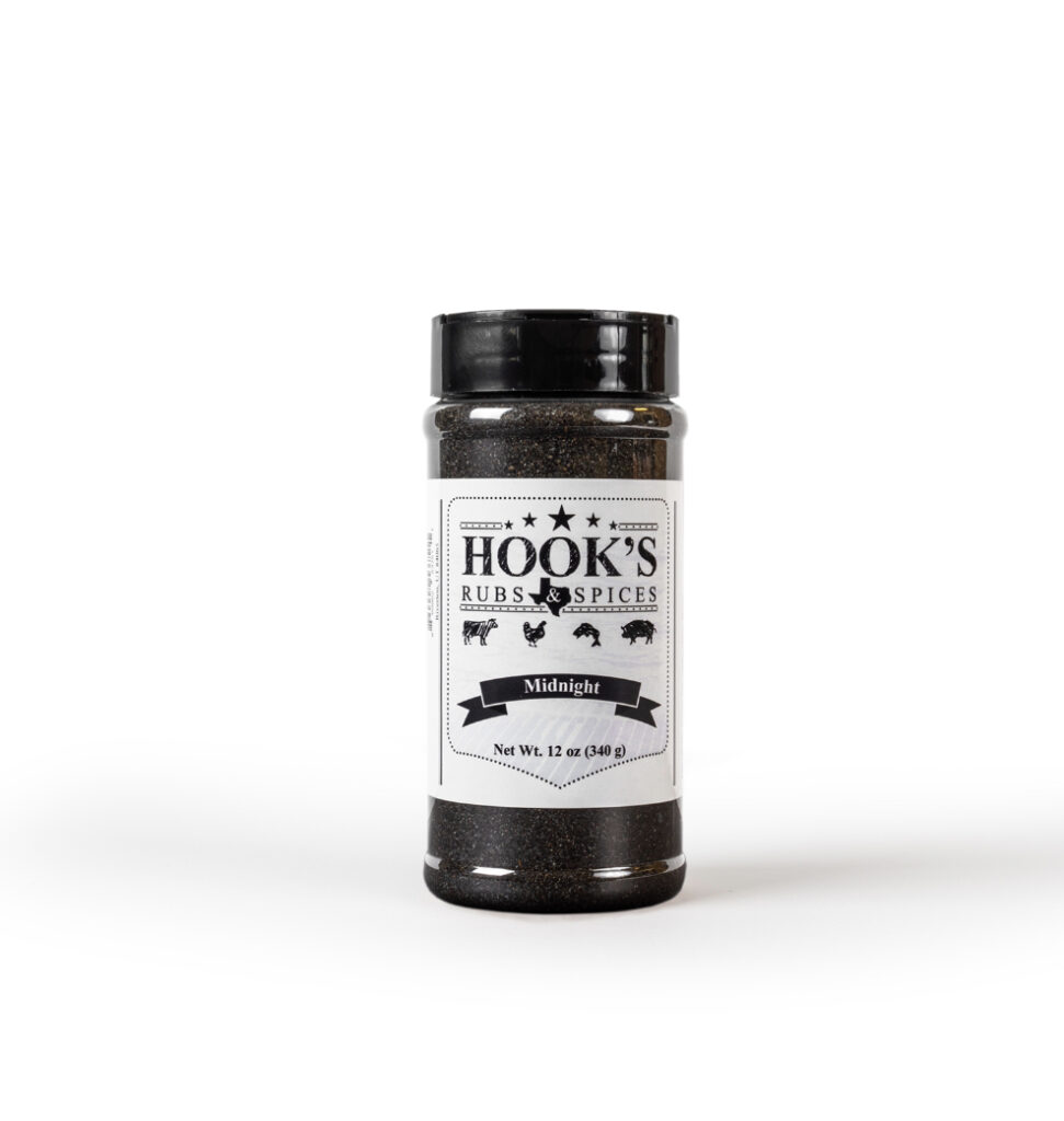 A jar of black pepper on a white background