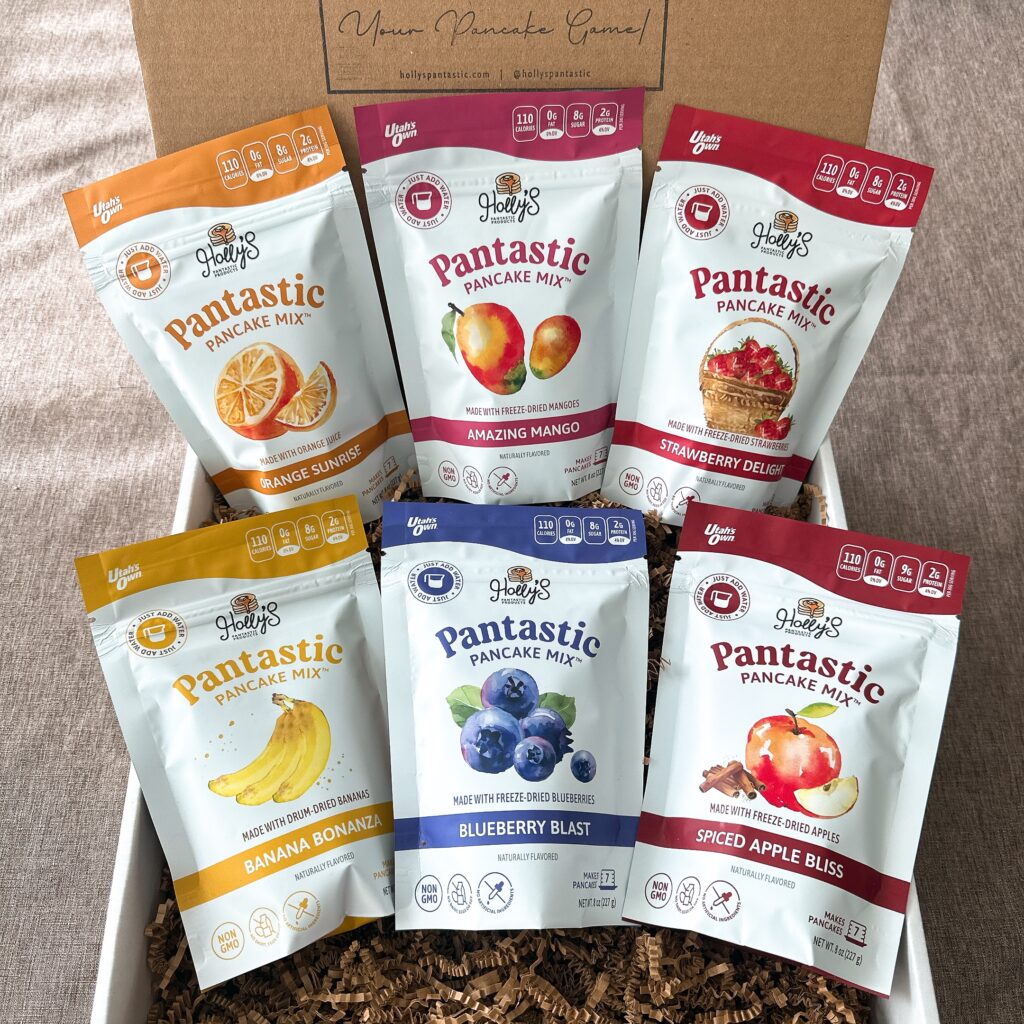Packaged Product text reads: Holly's Pantastic Products Pantastic Pancake Mix on six different packages