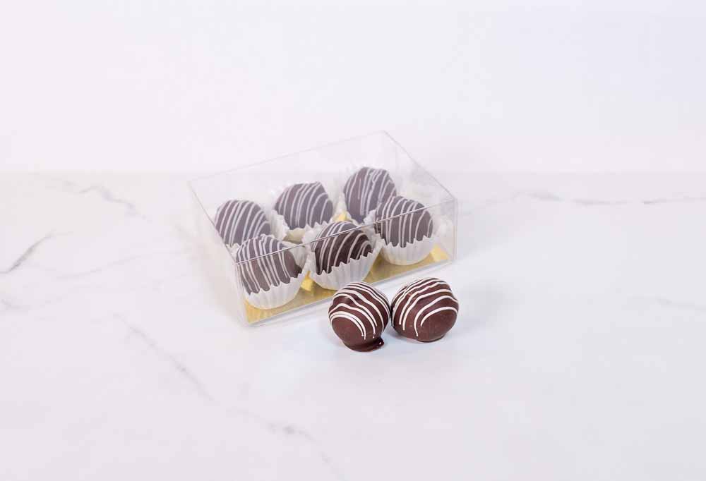 A couple of pieces of chocolate on a table