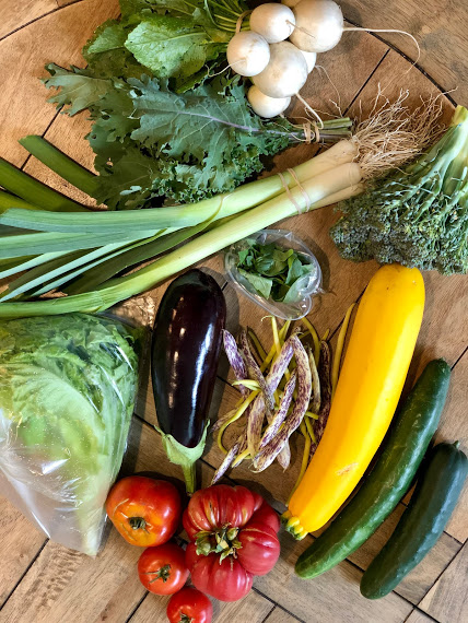 A table filled with a variety of fresh vegetables