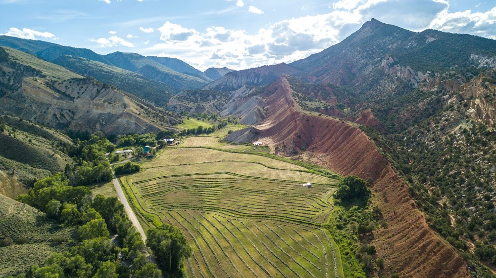 An aerial view of a valley in the mountains