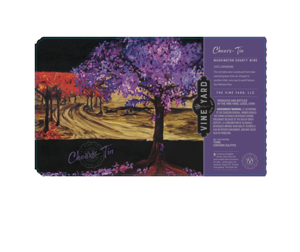 A greeting card featuring a vibrant purple tree design