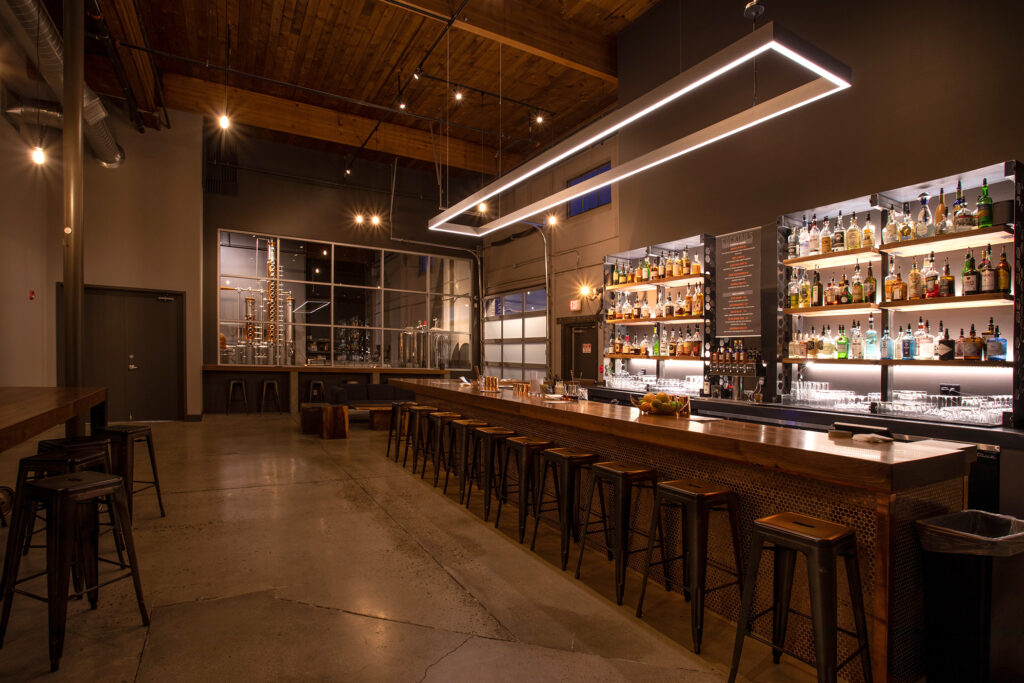 A cozy bar with numerous stools perfect for socializing