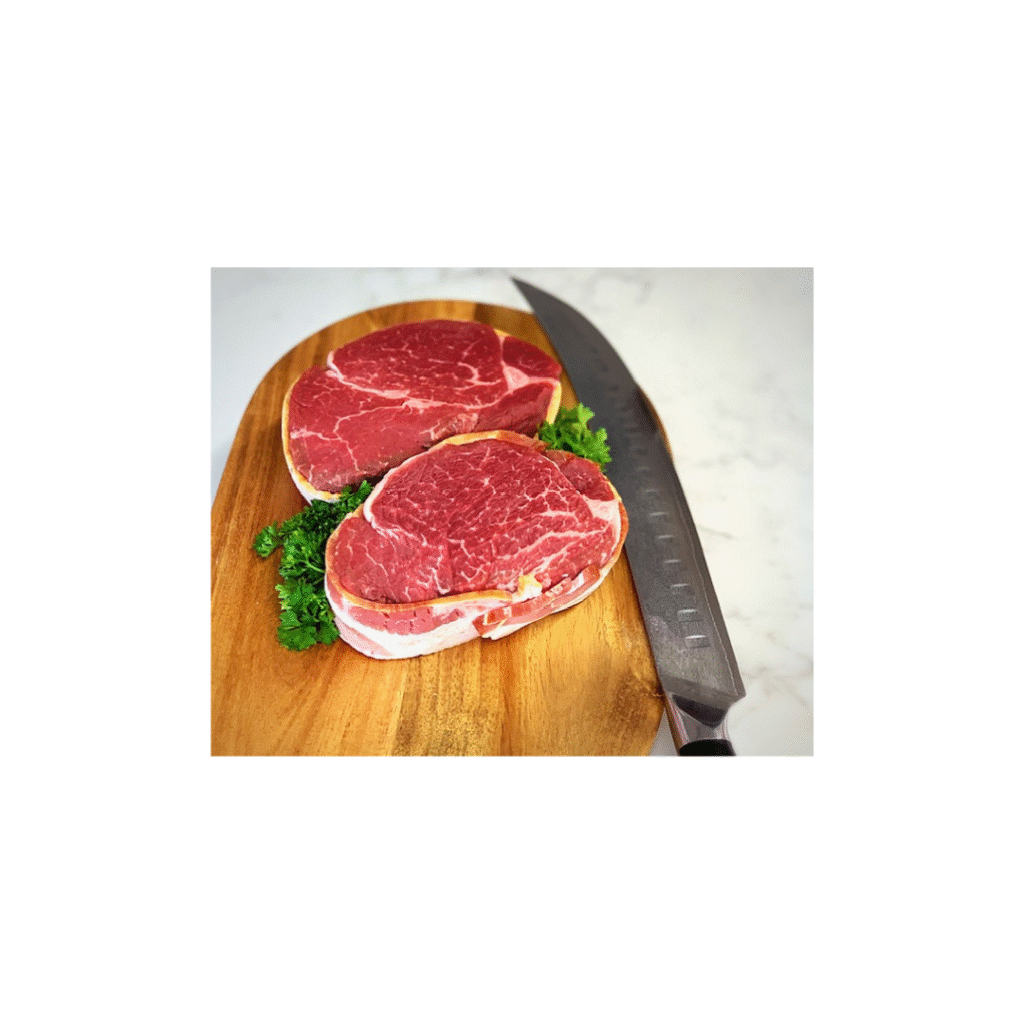 steak filets on cutting board