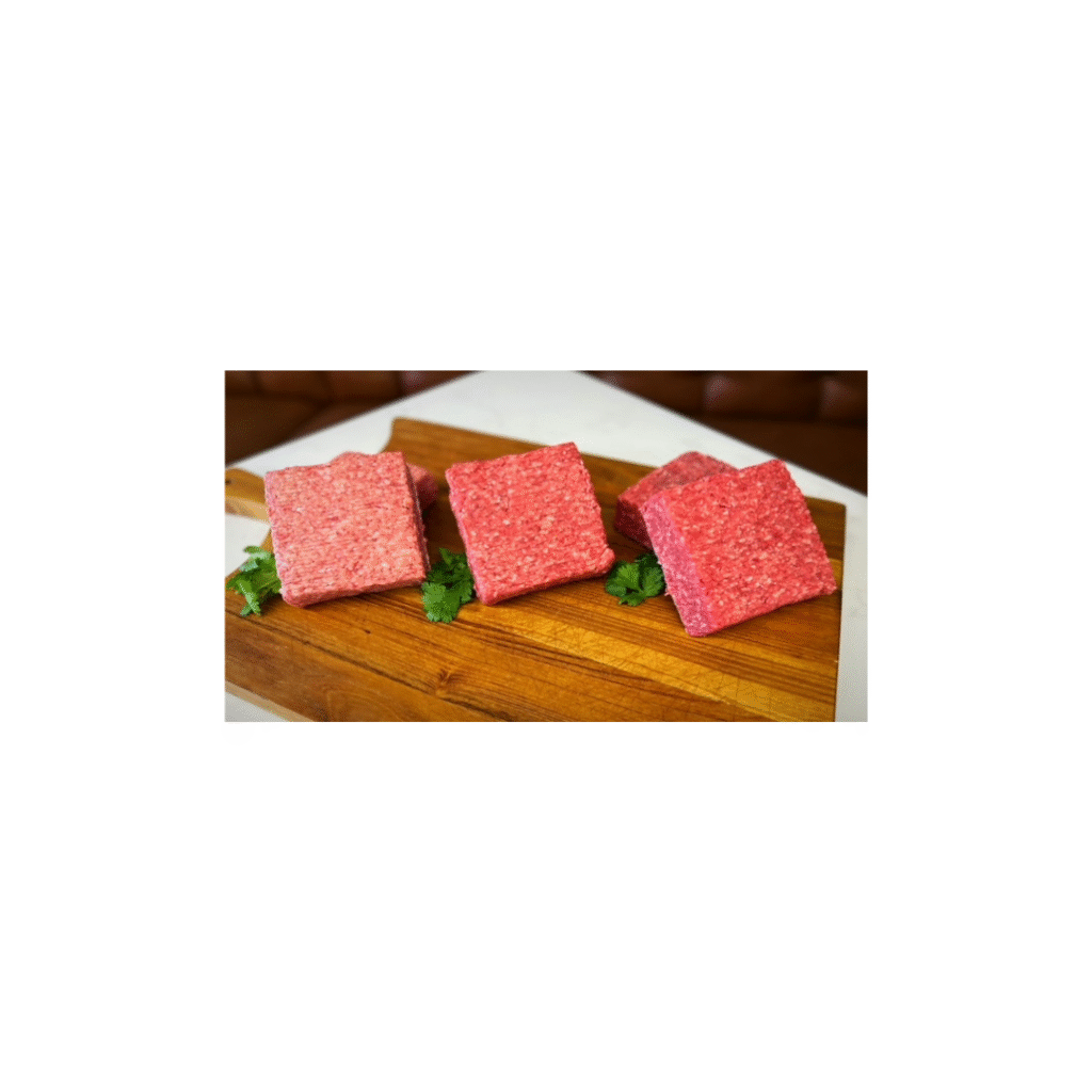 ground beef patties on cutting board