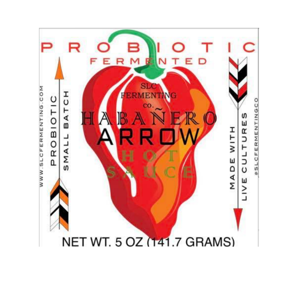 A product label featuring a vibrant red pepper